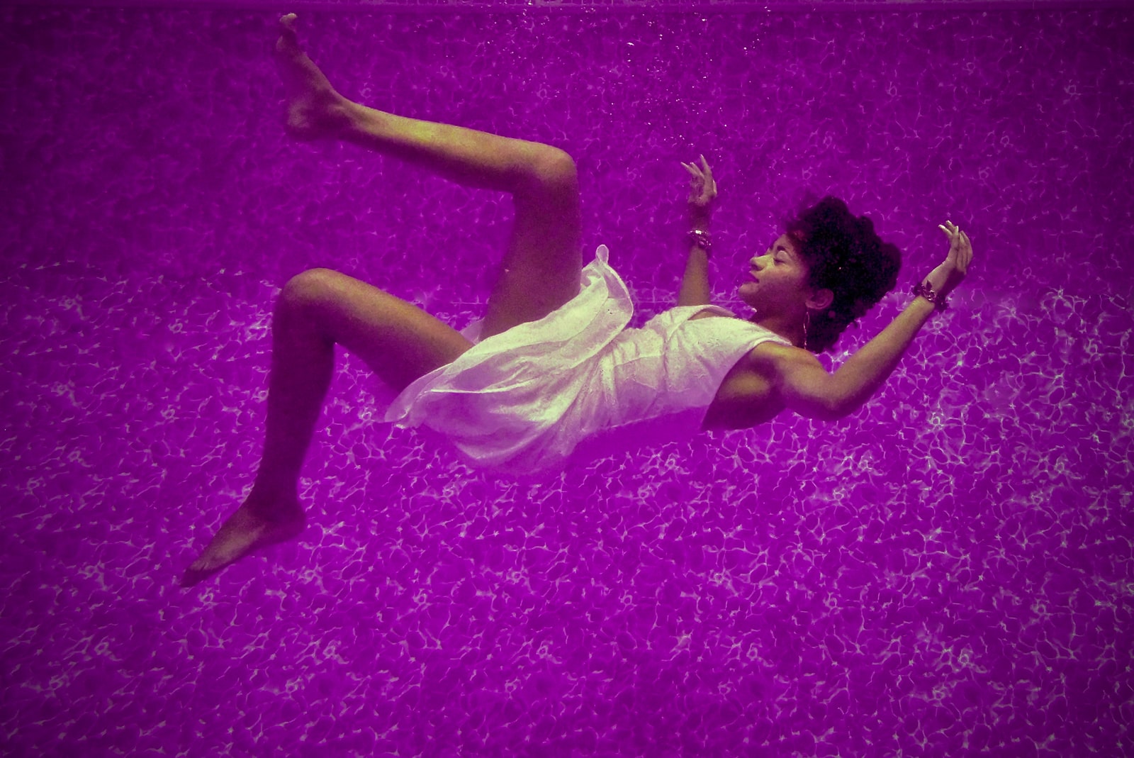 woman falls on purple surface why do we dream