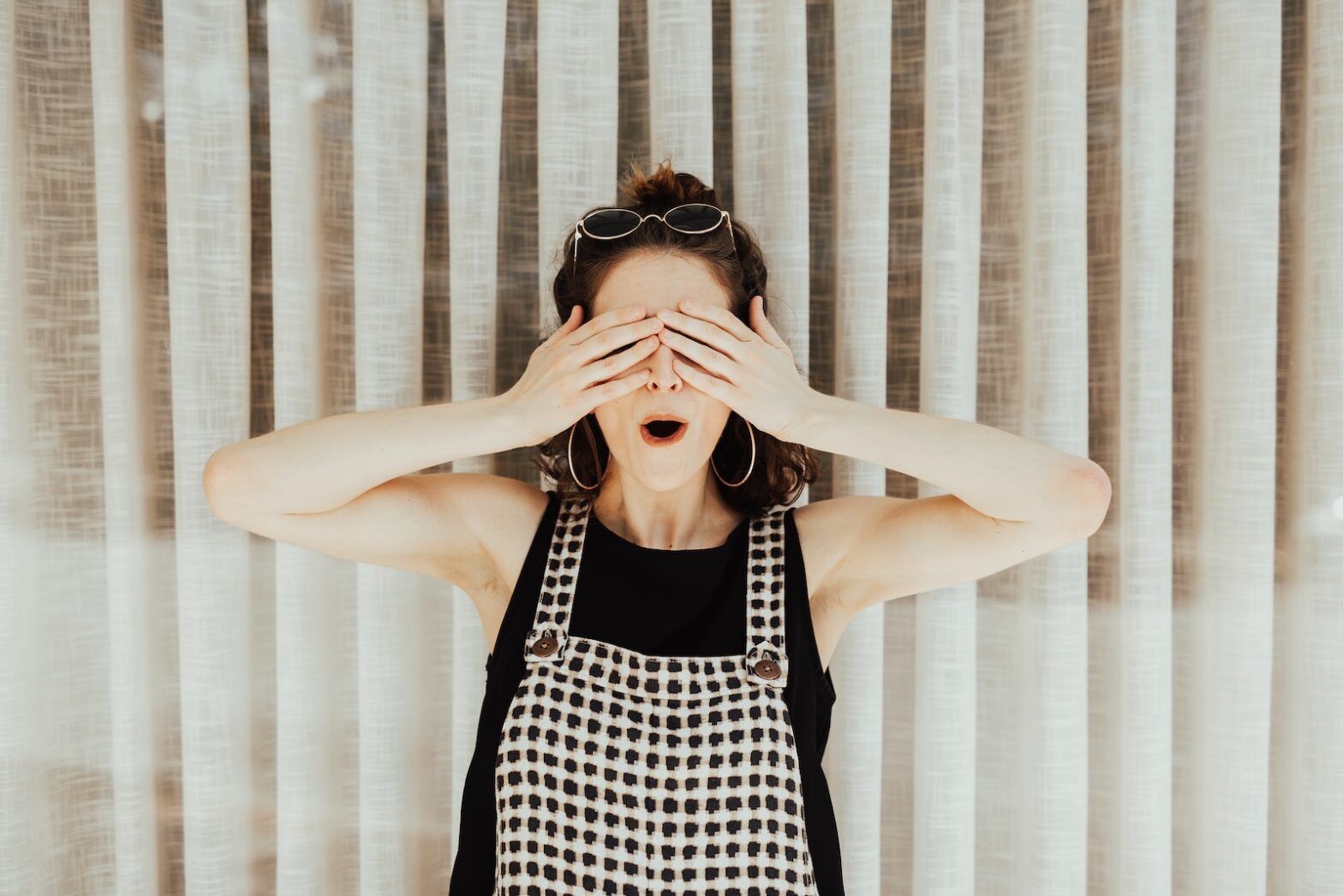 woman covering eyes with hand. microsleeping